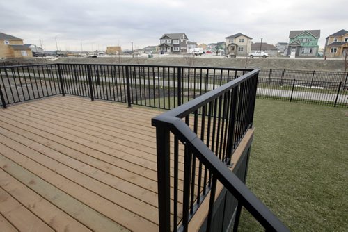 Homes. The backdoor deck at 175 Lake Bend Road, a Kensington Homes show home. The sales rep. is Sabie Brar. Todd Lewys story   Wayne Glowacki / Winnipeg Free Press Nov. 14. 2013