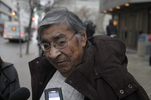 Lawrence Okemow, family friend of Lorna Blacksmith speaks to reporters outside the Manitoba Law Courts Thursday after serial killer Shawn Cameron Lamb was  sentenced to 20 years for killing two vulnerable city women . Mike McIntyre/ James Turner story   Wayne Glowacki / Winnipeg Free Press Nov. 14. 2013