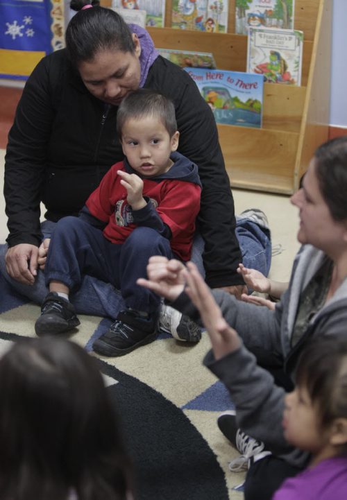 At left, Jordan with his mother Roanna Harper in the Little Red Spirit Aboriginal Head Start Program at 185 Young St. Mary Agnes Welch story   Wayne Glowacki / Winnipeg Free Press Nov. 14. 2013