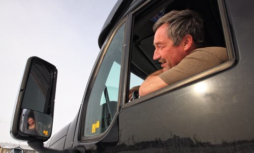 Darrel Unger from Rush Lake, SK, has been waiting in his truck in the parking lot of Nick's Inn in Headingly since 5:30 this morning because the Transcanada Highway has been closed as a result of bad weather. 131117 - November 17, 2013 MIKE DEAL / WINNIPEG FREE PRESS