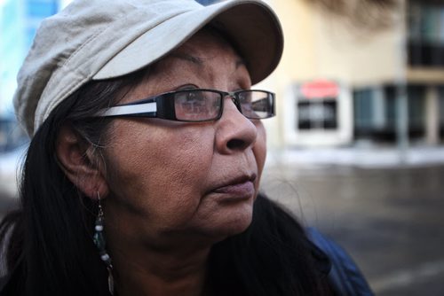 Joyce Nepinak mother of Tanya Nepinak, who went missing in September 2011 attends the protest along with around one-hundred others outside the Law Courts building at York Avenue and Kennedy Street over the lunch hour to protest injustices towards Aboriginal women.  131118 - November 18, 2013 MIKE DEAL / WINNIPEG FREE PRESS