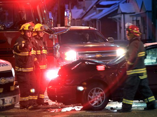 Tis' the Season. A woman was transported to the hospital after a two vehicle collision on Arlington St. at Sargent Ave. Tuesday morning, it was one of three collisions on Winnipeg streets  emergency crews were at attending at this time.     Wayne Glowacki / Winnipeg Free Press Nov. 19. 2013