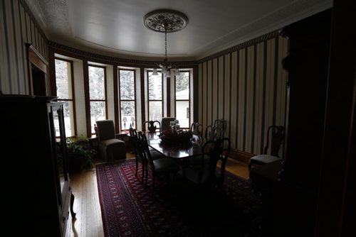 diningroom with large bay window looking to the back yard garden - Historic Morden  Stephen St. stone home  is up for sale built in 1902 Äì bill redekop story  Nov. 19 2013 / KEN GIGLIOTTI / WINNIPEG FREE PRESS