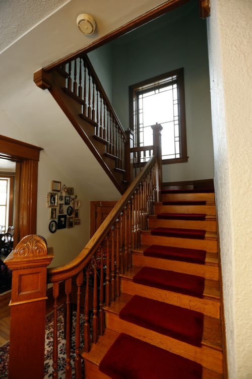 hand crafted staircase  to upper level- Historic Morden  Stephen St. stone home  is up for sale built in 1902 Äì bill redekop story  Nov. 19 2013 / KEN GIGLIOTTI / WINNIPEG FREE PRESS