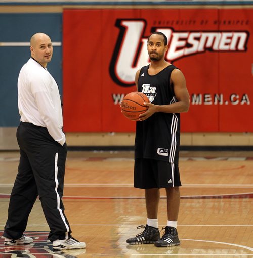 Wesmen Basketball coach Mike Raimbault and Andrew Cunningham (right) at a practice Tuesday afternoon at the Duckworth Center. See Tim Campbell's story. November 19, 2013 - (Phil Hossack / Winnipeg Free Press)