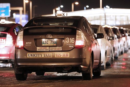 November 19, 2013 - 131119  -  TAxis at the Winnipeg Airport Tuesday, November 19, 2013.  John Woods / Winnipeg Free Press