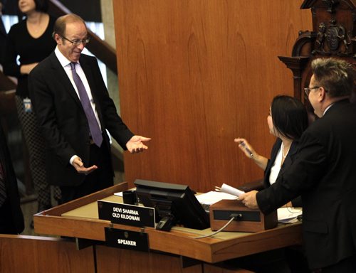 Prior to the meeting, Mayor Sam Katz gestures to Devi Sharma on her first day as Speaker at Wednesdays Winnipeg's City Council. Aldo Santin story.  Wayne Glowacki / Winnipeg Free Press Nov. 20. 2013