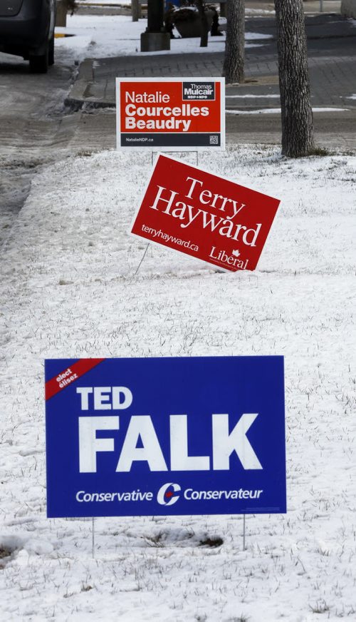 Niverville ,  Provencher  By- Election signs for Ted Falk  PC , Terry Hayward Liberal , and Natalie Courcelles Beaudry  NDP -  candidate  debate was held in Otterburne  BUT  Falk  did not take part in the debate -  Nov. 20 2013 / KEN GIGLIOTTI / WINNIPEG FREE PRESS
