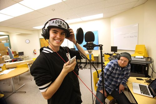 In Photo - Dahlen Barron  a grade 10 student taking part in recording program with local rapper Pip Skid, who has been mentoring Barron  and other students over the past few months to record their own rap music.   Quinn spearheads "Living in the City,"  is a Manitoba Arts Council and Louis Riel School Division joint funded program that puts together three local artists with students in the Division's Transition for Success (TFS) program at the Rene Deleurme Centre, an alternative high school. The kids in the program are recording some original rap tracks with local rapper Pip Skid, who has been mentoring them over the past few months.  November 21, 2013 Ruth Bonneville / Winnipeg Free Press
