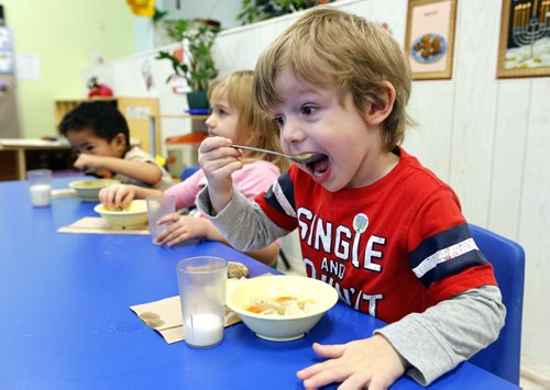Cooper age 3 eats suop - Life nutrition - Aleph-Bet Daycare, 1007 Sinclair Street.  STORY SUBJECT: Daycare nutrition programs and their mandate to follow Canada's Food Guide.  PHOTO SUGGESTION:  kids eating nutritious foods during their lunch break. EDITOR NOTE FYI...This daycare (Aleph-Bet) is not connected to the fine and nutrition controversy.¬ REPORTER: Shamona Harnett.   Monday Life Front.¬ Nov. 22 2013 / KEN GIGLIOTTI / WINNIPEG FREE PRESS