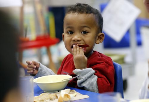 kids name is KIngston  age 3 (no lastname ) Life Front - Aleph-Bet Daycare, 1007 Sinclair Street.  STORY SUBJECT: Daycare nutrition programs and their mandate to follow Canada's Food Guide.  PHOTO SUGGESTION:  kids eating nutritious foods during their lunch break. EDITOR NOTE FYI...This daycare (Aleph-Bet) is not connected to the fine and nutrition controversy.¬ REPORTER: Shamona Harnett.   Monday Life Front.¬ Nov. 22 2013 / KEN GIGLIOTTI / WINNIPEG FREE PRESS