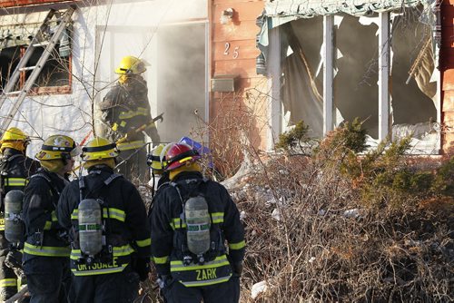 November 24, 2013 - 131124  -  Firefighters work to extinguish a fire at 25 Fleury Place Sunday, November 24, 2013. John Woods / Winnipeg Free Press