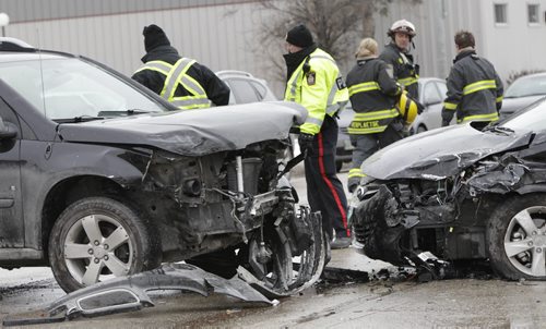 Emergency crews attended a motor vehicle collision on Osborne St. near Don Ave. that caused southbound traffic to be re-routed for a short time Monday afternoon. At least one person was checked out by paramedics.  Wayne Glowacki / Winnipeg Free Press Nov. 25. 2013