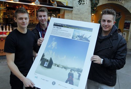 The Forks announces Six New Warming Huts. Event took place in the Forks Market Centre Court. Warming Huts v.2014: An Art and Architecture competition. 3rd year architecture students Matt Hagan, Evan Taylor, and Ryan Lewis with their drawing of their winning entry. BORIS MINKEVICH / WINNIPEG FREE PRESS  November 26, 2013