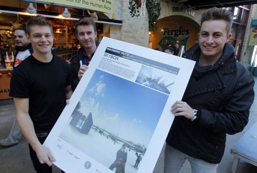 The Forks announces Six New Warming Huts. Event took place in the Forks Market Centre Court. Warming Huts v.2014: An Art and Architecture competition. 3rd year architecture students Matt Hagan, Evan Taylor, and Ryan Lewis with their drawing of their winning entry. BORIS MINKEVICH / WINNIPEG FREE PRESS  November 26, 2013