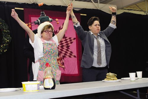 Canstar Community News Judy Wasylycia-Leis (left) and Chantel Marostica were both declared winners in the pancake eating contest. (JORDAN THOMPSON)
