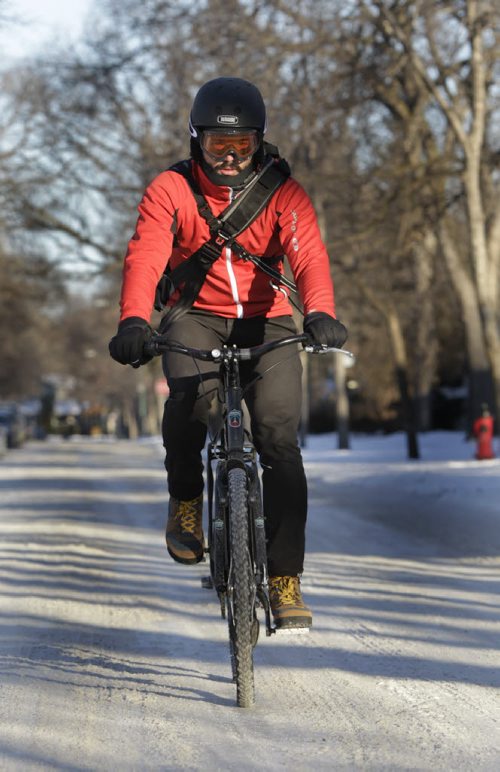 49.8 - PULSE - winter cycling tips..  J.C. Carson a Woodcock Cycle Works sales rep. and winter cyclist.  Geoff Kirbyson story. Wayne Glowacki / Winnipeg Free Press Nov. 26. 2013