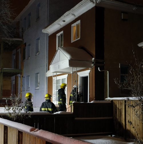 Wpg Fire Dept . Quickly put out a fire in an attic  two suite house  at 6am  that caused the self evacuation to 4 people without injury , the people from only one of the suites at  Spence  St near Cumberland Ave fire scene were allowed to return  Nov. 28 2013 / KEN GIGLIOTTI / WINNIPEG FREE PRESS