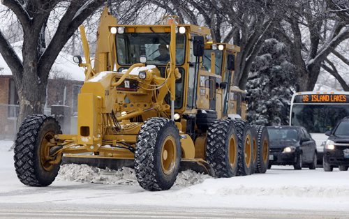 STDUP - Snow Removal city ploughs are out on Burrows Ave clearing streets  after Wed.'s snow fall  Nov. 28 2013 / KEN GIGLIOTTI / WINNIPEG FREE PRESS