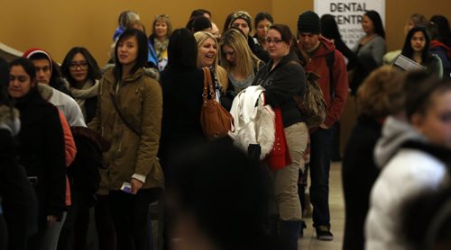 Black Friday  in WPG kicked off with thousands of consumers heading for Polo Park Mall and the stores ringing the area  with some stores opening at 6and 7am Äì Nov. 29 2013 / KEN GIGLIOTTI / WINNIPEG FREE PRESS  OUR WINNIPEG Äì in photo hundreds line up for free  gift cards to Polo Park  stores at 6am .
