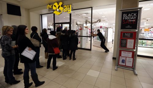 Black Friday  in WPG  kicked off with thousands of consumers heading for Polo Park Mall and the stores ringing the area  with some stores opening at 6and 7am Äì Nov. 29 2013 / KEN GIGLIOTTI / WINNIPEG FREE PRESS  OUR WINNIPEG  in photo The Bay  had the longest line , they gave away gift cards  , at the 7am opening