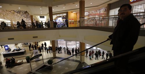 Black Friday  in WPG  kicked off with thousands of consumers heading for Polo Park Mall and the stores ringing the area  with some stores opening at 6and 7am - Nov. 29 2013 / KEN GIGLIOTTI / WINNIPEG FREE PRESS  OUR WINNIPEG Äì in photolong lines outside the  Bay lowerlevel for free gift cards  , lines for several upper and lower  level stores were seen