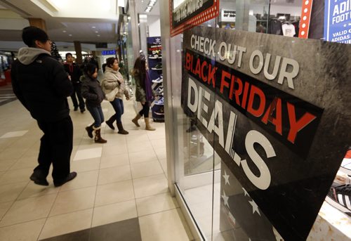Black Friday  in WPG  kicked off with thousands of consumers heading for Polo Park Mall and the stores ringing the area  with some stores opening at 6and 7am Äì Nov. 29 2013 / KEN GIGLIOTTI / WINNIPEG FREE PRESS  OUR WINNIPEG Äì in photo sports shoes and clothing did brisk business at Polo Park