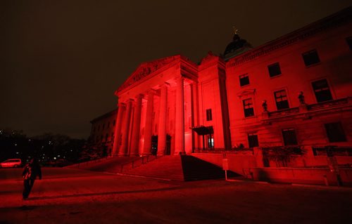 The Manitoba Legislative Building is lit up red in honour of tomorrow's World Aids Day, Saturday, November 30, 2013. (TREVOR HAGAN/WINNIPEG FREE PRESS)