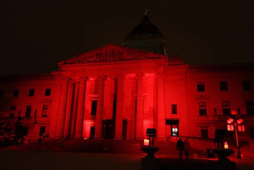 The Manitoba Legislative Building is lit up red in honour of tomorrow's World Aids Day, Saturday, November 30, 2013. (TREVOR HAGAN/WINNIPEG FREE PRESS)