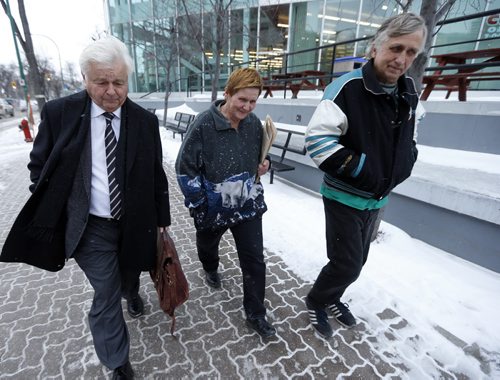 Law Courts , Animal hoarding  case involving animal abusers RtoL Peter and Judith Chernecki, leaving court with Lawyer Jay Prober -after guity plea- Dec. 3 2013 / KEN GIGLIOTTI / WINNIPEG FREE PRESS