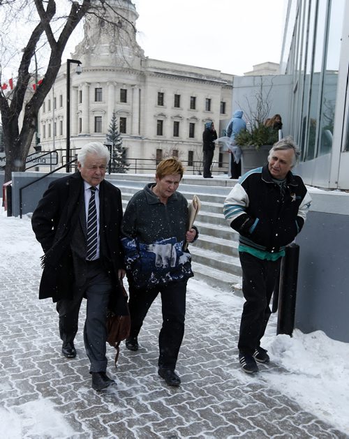 Law Courts , Animal hoarding  case involving animal abusers Peter and Judith Chernecki, plead gulity to animal hoarding  leaving courthouse with  (left) lawyer Jay Prober- Dec. 3 2013 / KEN GIGLIOTTI / WINNIPEG FREE PRESS