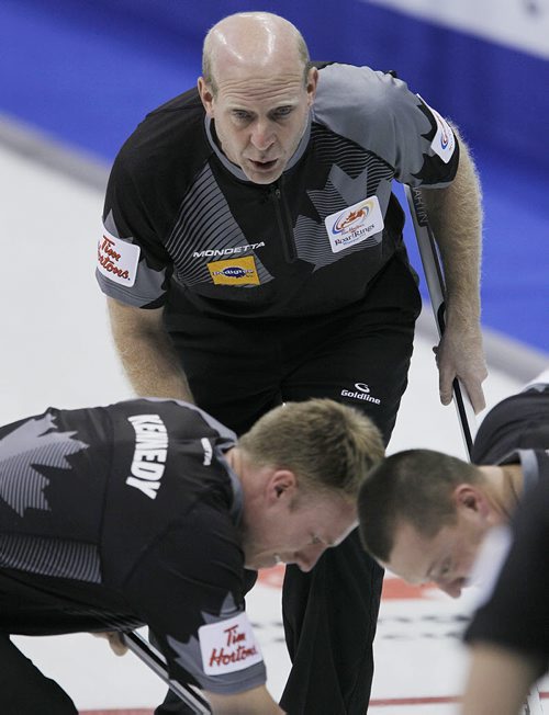 December 3, 2013 - 131203  - Skip Kevin Martin calls to his sweepers during draw 8 against Glenn Howard at the Roar Of The Rings in Winnipeg Tuesday, December 3, 2013. John Woods / Winnipeg Free Press