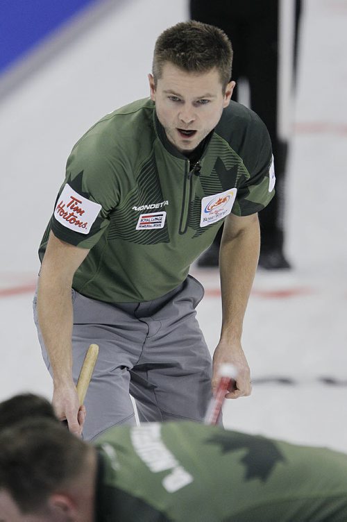 December 3, 2013 - 131203  - Skip Mike McEwen calls to his sweepers during draw 8 against John Epping at the Roar Of The Rings in Winnipeg Tuesday, December 3, 2013. John Woods / Winnipeg Free Press