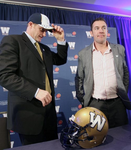Winnipeg Blue Bombers new head coach Mike O'Shea is introduced by Winnipeg Blue Bombers GM Kyle Walters at a news conference at the Fairmont Hotel in downtown Winnipeg Wednesday afternoon-   See Gary Lawless and Melissa Martin  stories- Dec 04, 2013   (JOE BRYKSA / WINNIPEG FREE PRESS)