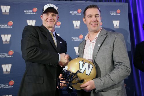 Winnipeg Blue Bombers new head coach Mike O'Shea is introduced by Winnipeg Blue Bombers GM Kyle Walters at a news conference at the Fairmont Hotel in downtown Winnipeg Wednesday afternoon-   See Gary Lawless and Melissa Martin  stories- Dec 04, 2013   (JOE BRYKSA / WINNIPEG FREE PRESS)