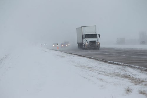 Motorists make their way into Winnipeg just west of Winnipeg in blowing snow Wednesday afternoon.  Dec 04, 2013 Ruth Bonneville / Winnipeg Free Press