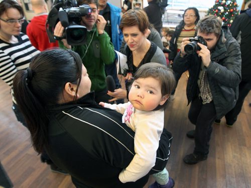 Pamela Harper with her 1 year old neice Alizaya at Hunger of Hope news conference Wednesday at the Ma Mawi Wi Che Itata Centre- Alizayas family uses the program for infant formula and baby food- See Adam Wazny story- Dec 04, 2013   (JOE BRYKSA / WINNIPEG FREE PRESS)