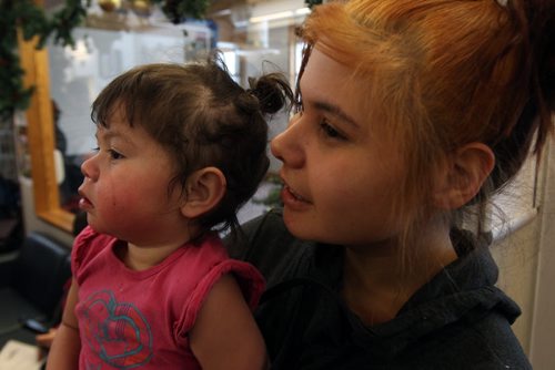 Nicole Keeper with her 21 month old daughter Tashantay Keeper at Hunger of Hope news conference Wednesday at the Ma Mawi Wi Che Itata Centre- Nicole uses the program for infant formula and baby food- See Adam Wazny story- Dec 04, 2013   (JOE BRYKSA / WINNIPEG FREE PRESS)