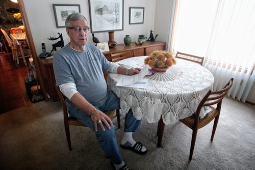 Gary Moore recently got a form letter from the WRHA saying he would have to wait seven months for a consultation and eight months after that for a redo of one of his artificial hips. 131204 - December 4, 2013 MIKE DEAL / WINNIPEG FREE PRESS