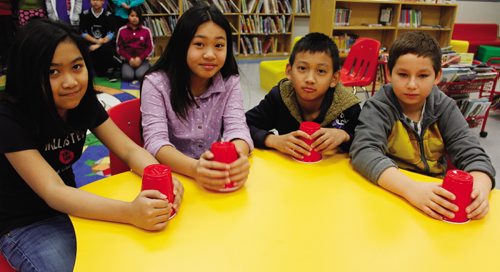 Canstar Community News Dec. 4 -- Sister MacNamara students are making a music video project, using the tune of the song "Cups", to spread messages about anti-bullying.