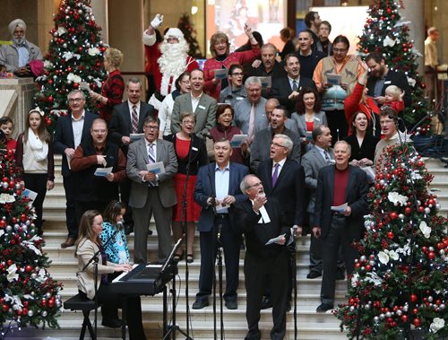 A choir made up of MLAs and Premier Greg Selinger and led by speaker Daryl Reid entertains visitors at the Legislative Open House at the Manitoba Legislature on Sat., Dec. 7, 2013. Photo by Jason Halstead/Winnipeg Free Press