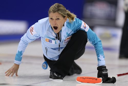 Skip Sherry Middaugh calls to her sweepers during action against Jennifer JonesÄôs team in the womenÄôs final of Roar of the Rings curling at the MTS Centre on Sat., Dec. 7, 2013. Photo by Jason Halstead/Winnipeg Free Press