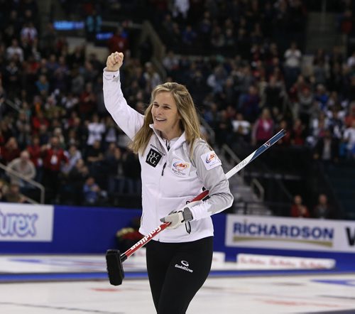 Skip Jennifer celebrates after defeating Sherry Middaugh in the womenÄôs final of Roar of the Rings curling at the MTS Centre on Sat., Dec. 7, 2013 to win the right to represent Canada at the Winter Olympics in Sochi, Russia, in February. Photo by Jason Halstead/Winnipeg Free Press