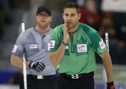Skip John Morris calls on sweepers after shooting during action against Brad JacobsÄôs team in the menÄôs final of Roar of the Rings curling at the MTS Centre on Sun., Dec. 8, 2013. Photo by Jason Halstead/Winnipeg Free Press