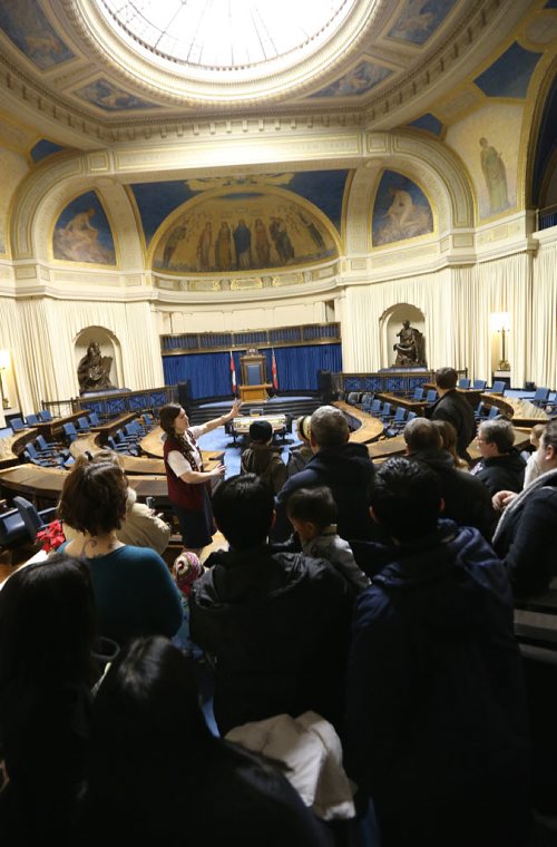 Visitors at the Legislative Open House take a tour of the Legislative Chamber on Sat., Dec. 7, 2013. Photo by Jason Halstead/Winnipeg Free Press