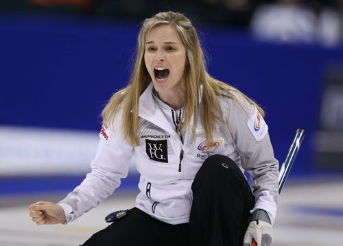 Skip Jennifer Jones calls to her sweepers during action against Sherry MiddaughÄôs team in the womenÄôs final of Roar of the Rings curling at the MTS Centre on Sat., Dec. 7, 2013. Photo by Jason Halstead/Winnipeg Free Press