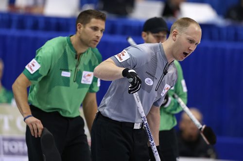 Skip Brad Jacobs calls on sweepers on the way to defeating John MorrisÄôs team in the menÄôs final of Roar of the Rings curling at the MTS Centre on Sun., Dec. 8, 2013. Jacobs won the right to represent Canada at the Winter Olympics in Sochi, Russia, in February.