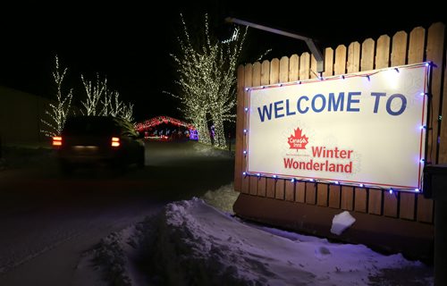 Visitors check out the Canad Inns Winter Wonderland drive-through holiday light park at Red River Exhibition Park on Sun., Dec. 8, 2013. Photo by Jason Halstead/Winnipeg Free Press