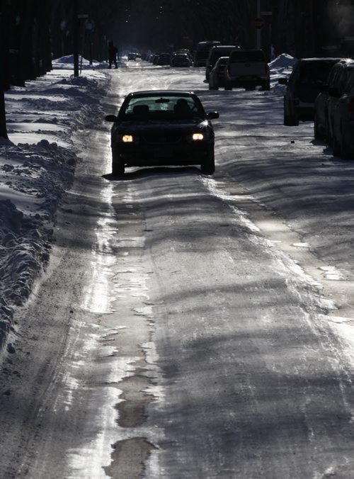 Ruts on residential streets that have not been plowed after recent snow storm have made driving difficult including Borebank St in River Heights-See story- Dec 09, 2013   (JOE BRYKSA / WINNIPEG FREE PRESS)