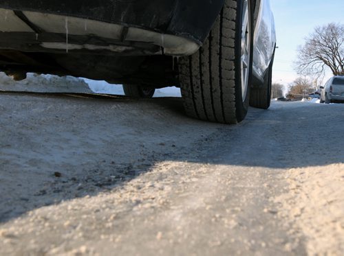 Ruts on streets such as this one at Pzcific Ave West in Winnipeg Monday-See story- Dec 09, 2013   (JOE BRYKSA / WINNIPEG FREE PRESS)